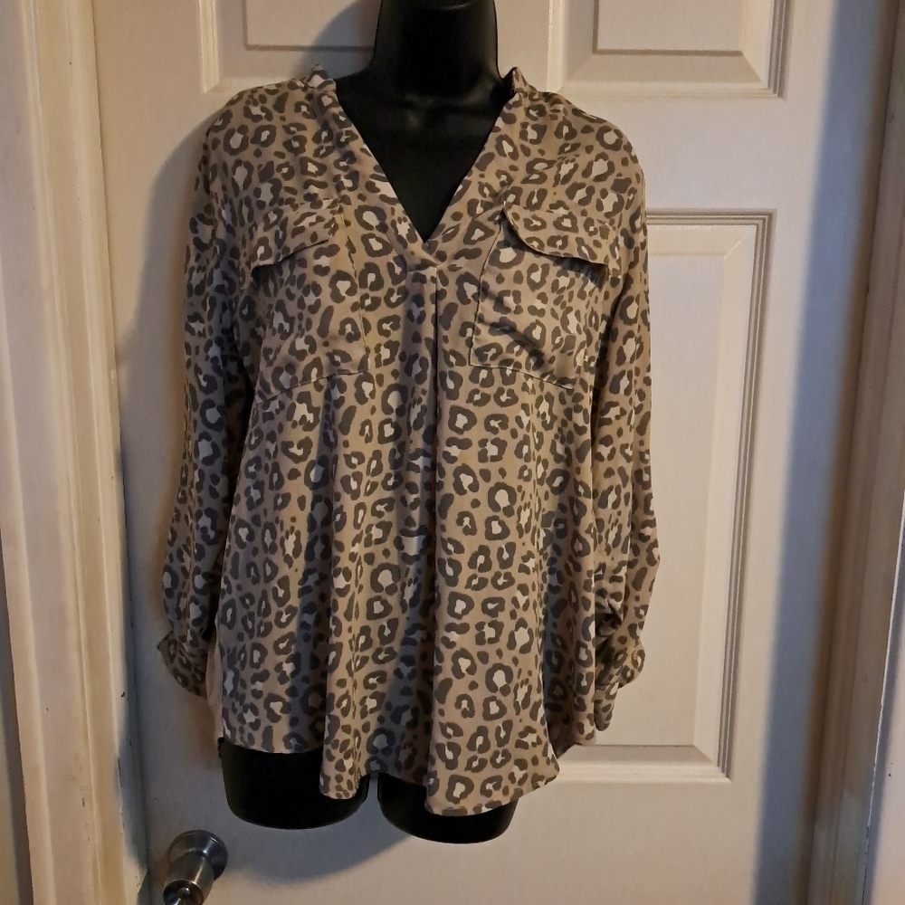 A new day animal Print blouse size medium A-49 5/$25